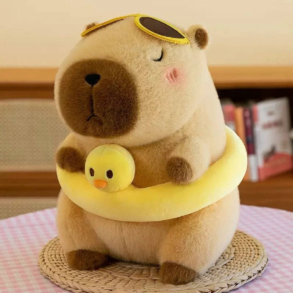 Jucărie din pluș Capibara cu colac și rățușcă, 27 cm (86688)